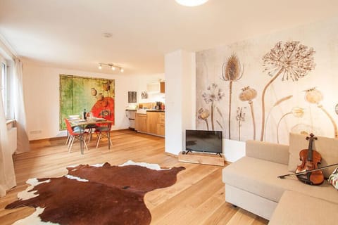 Apartment | Living room | 120-cm LED TV with cable channels, TV