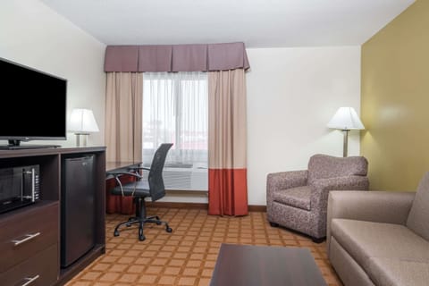 Studio Suite, 1 King Bed, Non Smoking | Desk, laptop workspace, blackout drapes, iron/ironing board