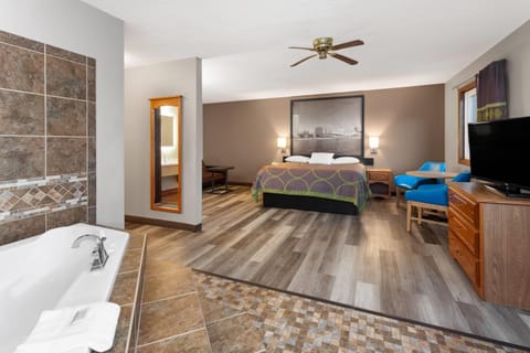 Suite, 1 King Bed, Non Smoking, Jetted Tub | Desk, iron/ironing board, free cribs/infant beds, rollaway beds