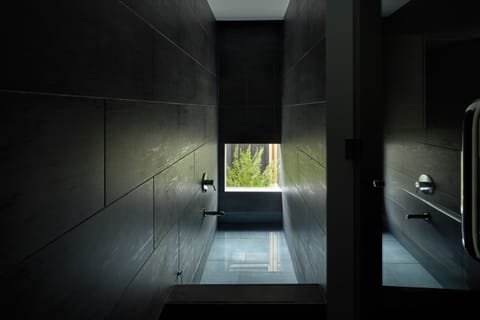 Separate tub and shower, free toiletries, hair dryer, slippers