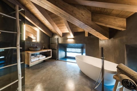 Designer toiletries, hair dryer, bathrobes, slippers