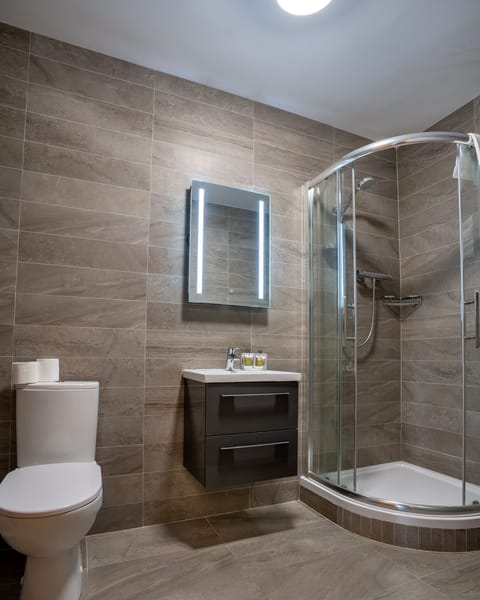 Shower, free toiletries, hair dryer, towels