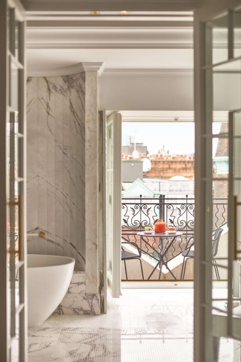 The Cadogan Penthouse | Bathroom | Designer toiletries, hair dryer, bathrobes, slippers