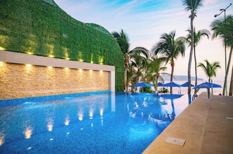 2 outdoor pools, pool umbrellas, sun loungers