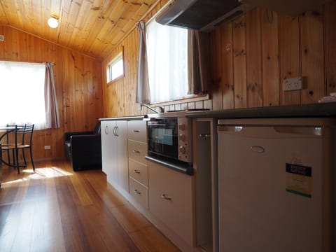 Deluxe Cabin, 2 Bedrooms | Private kitchenette | Full-size fridge, microwave, coffee/tea maker, electric kettle