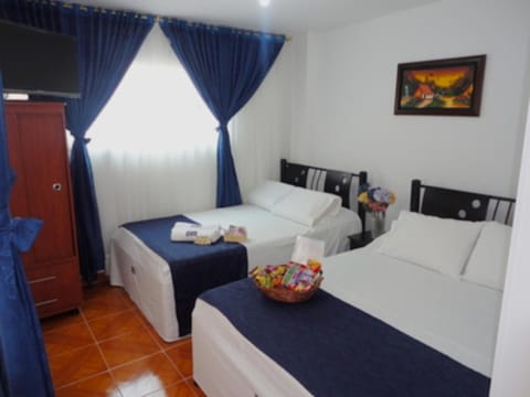 Egyptian cotton sheets, down comforters, pillowtop beds, minibar