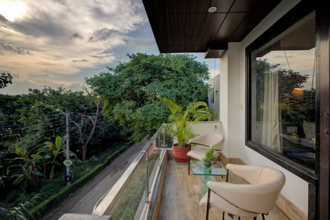Premium Room with Balcony | In-room safe, desk, laptop workspace, blackout drapes