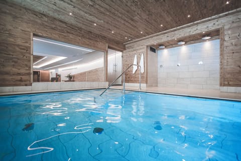 Outdoor pool, open 8:00 AM to 8:00 PM, pool umbrellas, sun loungers