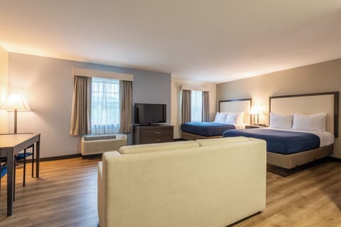 Premium bedding, desk, laptop workspace, iron/ironing board