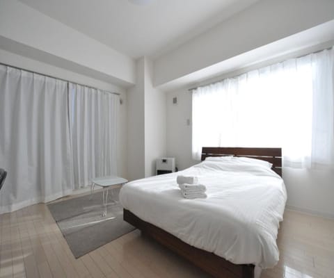 1 Bedroom Apartment | Living area | 16-inch flat-screen TV with digital channels, TV