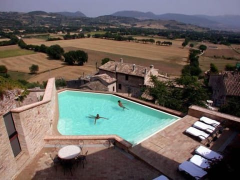 Seasonal outdoor pool, pool umbrellas, sun loungers