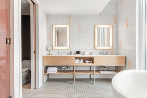 Suite, 1 King Bed with Sofa bed, Balcony | Bathroom | Free toiletries, hair dryer, towels, soap