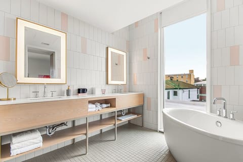 Suite, 1 King Bed with Sofa bed, Balcony | Bathroom | Free toiletries, hair dryer, towels, soap