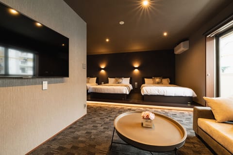 Superior C Non-Smoking | Living area | Flat-screen TV