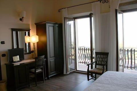 Junior Suite, Balcony | Premium bedding, minibar, in-room safe, desk