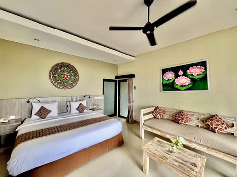 Suite Seaview Room | Minibar, individually decorated, individually furnished, free WiFi
