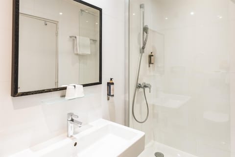 Family Room, 1 Queen Bed, Non Smoking (with Sofabed) | Bathroom | Shower, free toiletries, hair dryer, towels