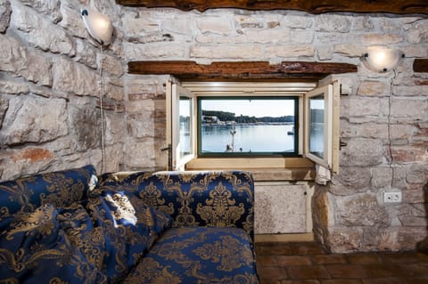 Apartment, 1 Bedroom, Sea View (Attic) | Living room | 60-cm TV with satellite channels