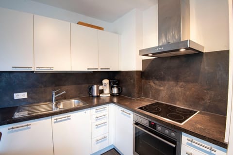 Apartment | Private kitchen | Coffee/tea maker, highchair