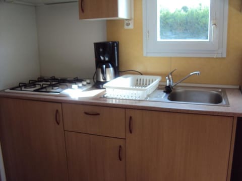 Mobile Home, 2 Bedrooms | Private kitchen | Full-size fridge, microwave, stovetop, coffee/tea maker