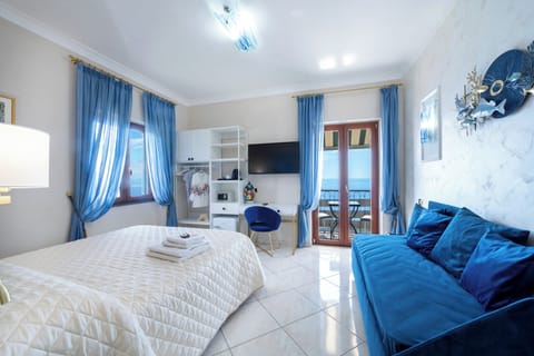 Superior Triple Room, Sea View | Premium bedding, down comforters, memory foam beds, minibar