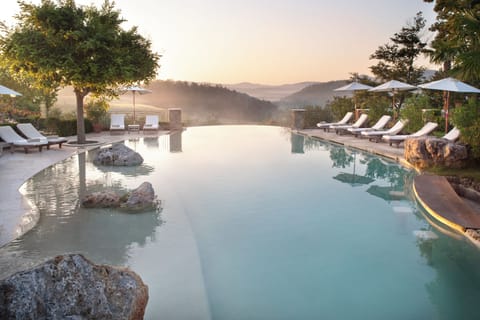 Outdoor pool, free cabanas, pool umbrellas