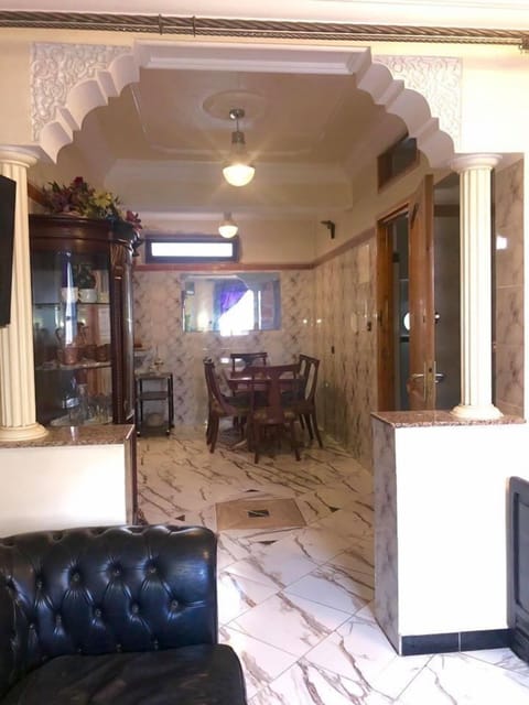 Apartment, 1 Bedroom | Living area | 32-inch flat-screen TV with satellite channels, TV