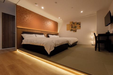 Quadruple Room, Non Smoking | Individually furnished, free WiFi, bed sheets