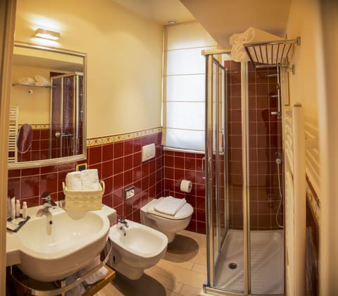 Junior Apartment, City View | Bathroom | Shower, free toiletries, hair dryer, bathrobes