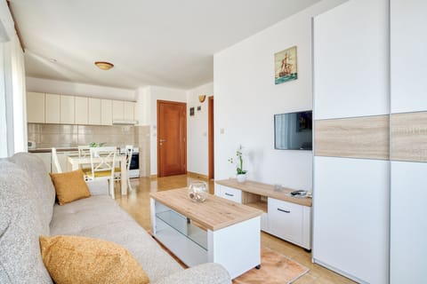 Deluxe Apartment, 1 Bedroom, Balcony, Sea View | Living area | 32-inch LCD TV with satellite channels, TV