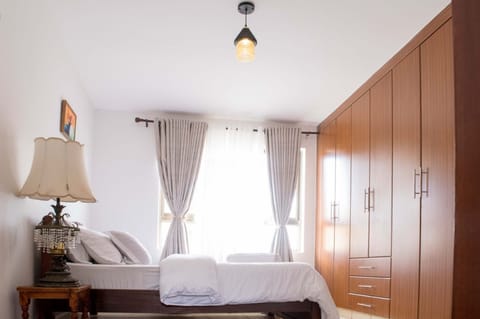 Apartment, 3 Bedrooms | Laptop workspace, blackout drapes, WiFi (free), bed sheets