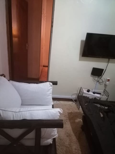 Apartment, 2 Bedrooms | Living room | 32-inch flat-screen TV with cable channels, TV