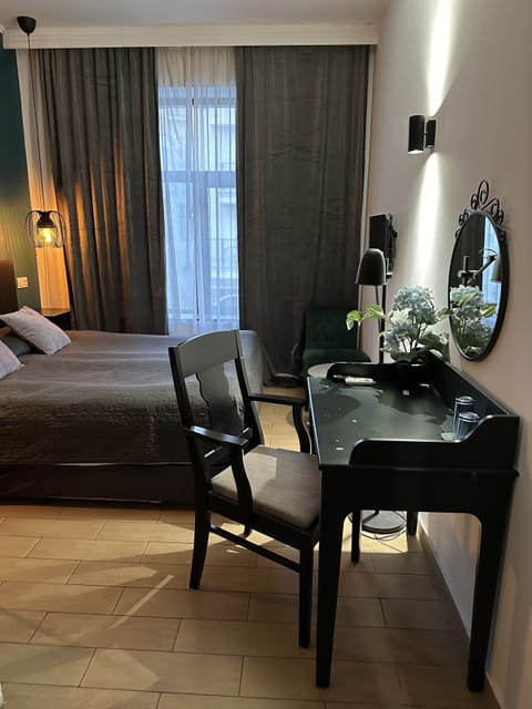 Double Room, City View | Soundproofing, iron/ironing board, free WiFi, bed sheets