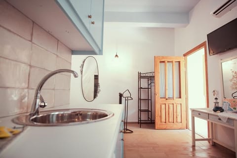 Studio, Ground Floor (Marika-Blue) | Private kitchenette | Mini-fridge, stovetop, coffee/tea maker, electric kettle