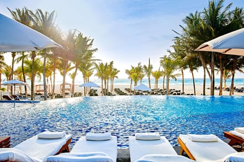 Outdoor pool, sun loungers, lifeguards on site