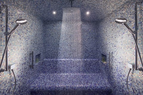 Separate tub and shower, rainfall showerhead, designer toiletries