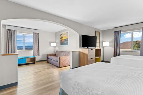 Studio Suite, 2 Queen Beds, Non Smoking | Blackout drapes, iron/ironing board, free cribs/infant beds, free WiFi