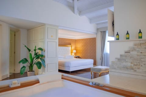 Standard Suite | Premium bedding, minibar, in-room safe, individually decorated