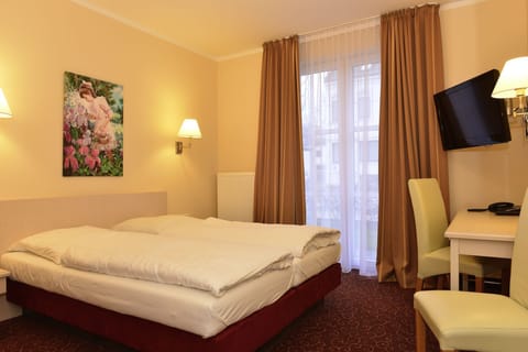 Hypo-allergenic bedding, desk, blackout drapes, soundproofing