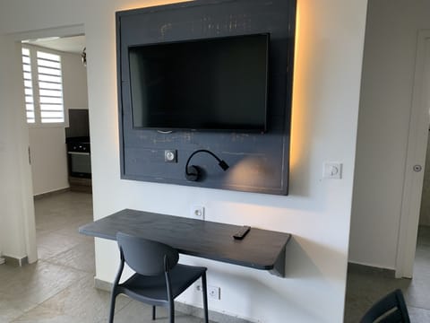 Deluxe Apartment, 2 Bedrooms, Terrace | Living area | 110-cm flat-screen TV with digital channels, TV