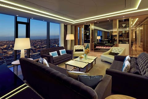 Presidential Suite, 1 King Bed | Living area | 40-inch LCD TV with digital channels, TV, books