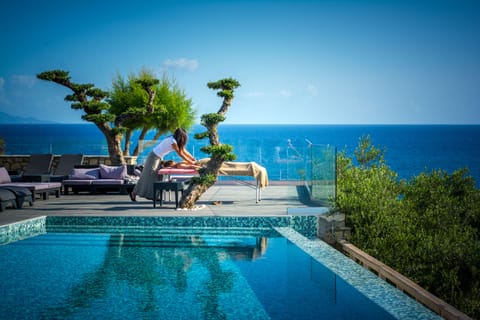 2 outdoor pools, pool umbrellas, sun loungers