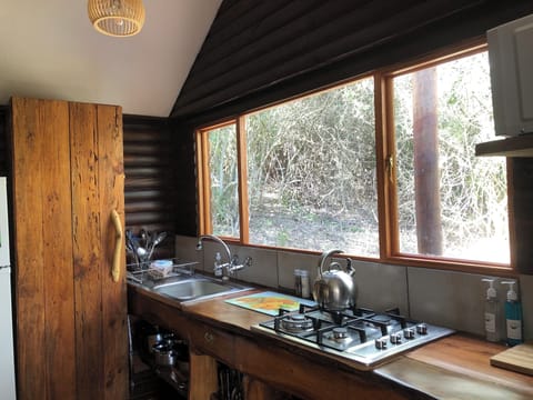 Deluxe Tent | Private kitchen | Full-size fridge, microwave, stovetop, toaster