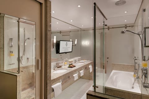 Combined shower/tub, designer toiletries, hair dryer, bathrobes