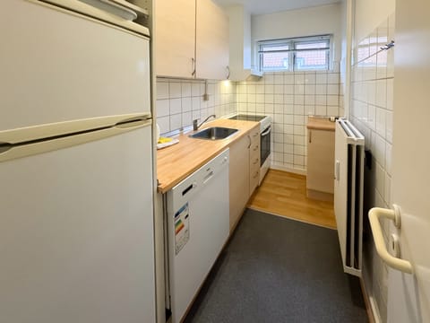 Apartment, 2 Bedrooms | Private kitchen | Full-size fridge, microwave, coffee/tea maker, electric kettle