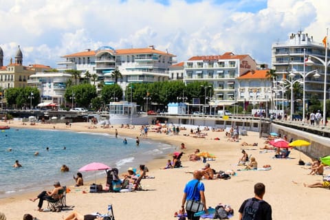 Beach nearby, white sand, sun loungers, beach umbrellas