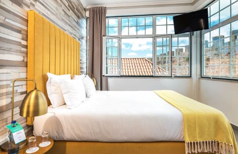 Charming Room | Minibar, in-room safe, individually decorated, individually furnished