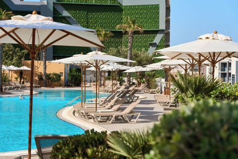 Indoor pool, seasonal outdoor pool, cabanas (surcharge), pool umbrellas