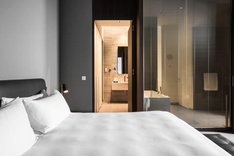 Premium bedding, down comforters, minibar, in-room safe