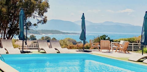 Seasonal outdoor pool, pool umbrellas, sun loungers